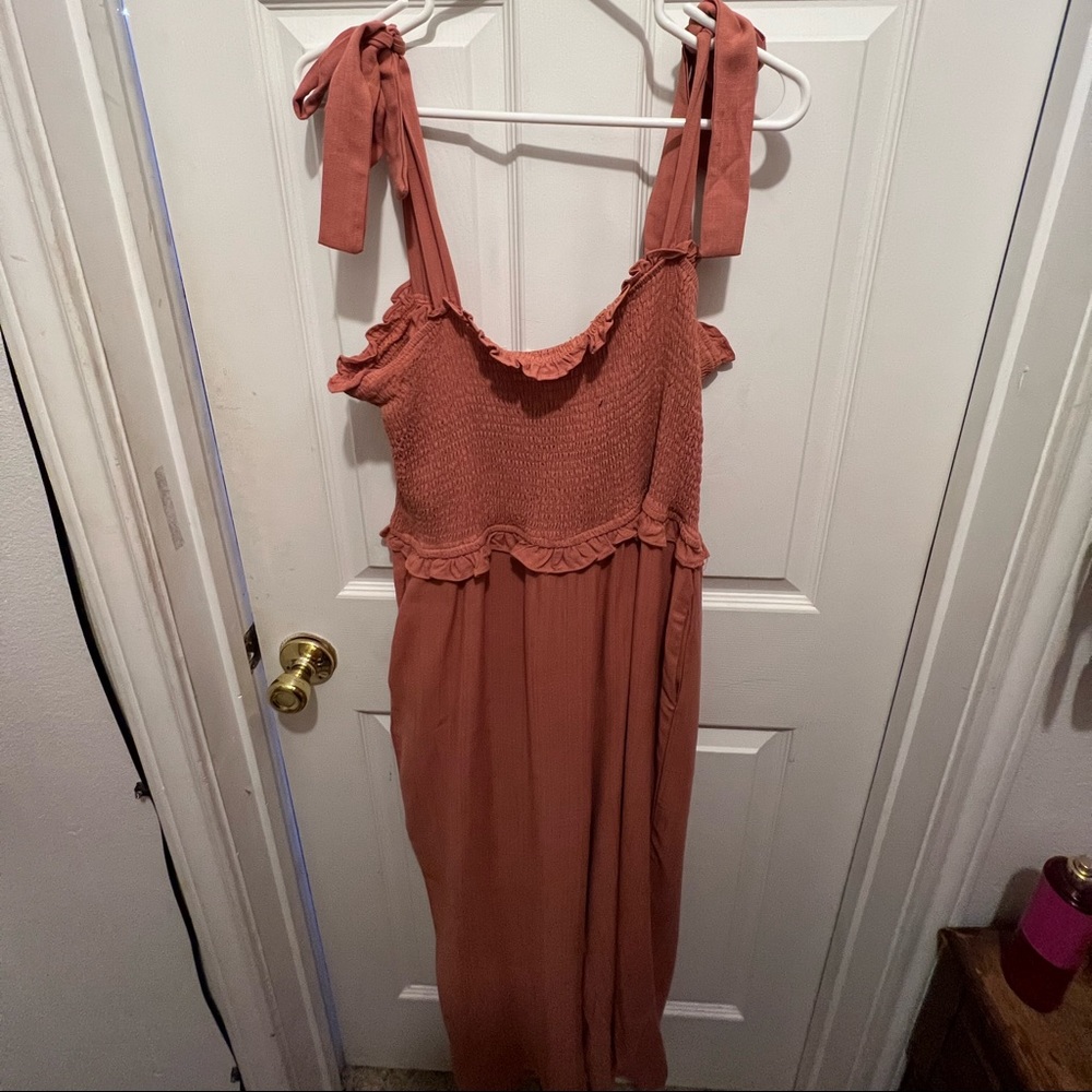 Romper/Jumpsuit with pockets and adjustable shoulder ties